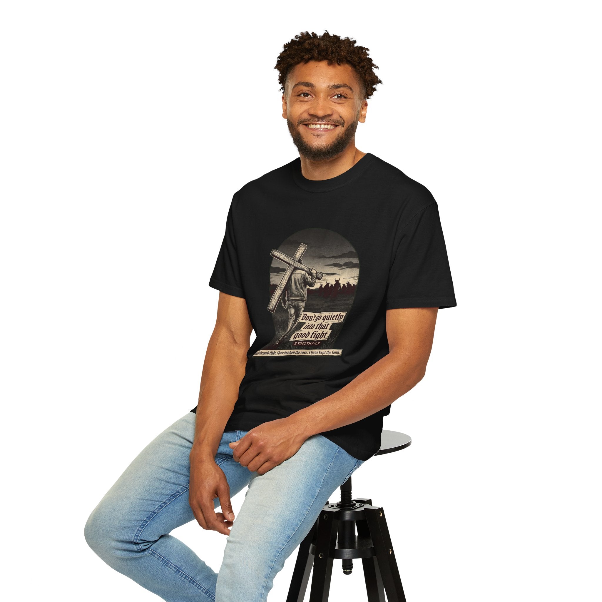 Black | Don't Go Quietly men's heavyweight tee — worn, seated