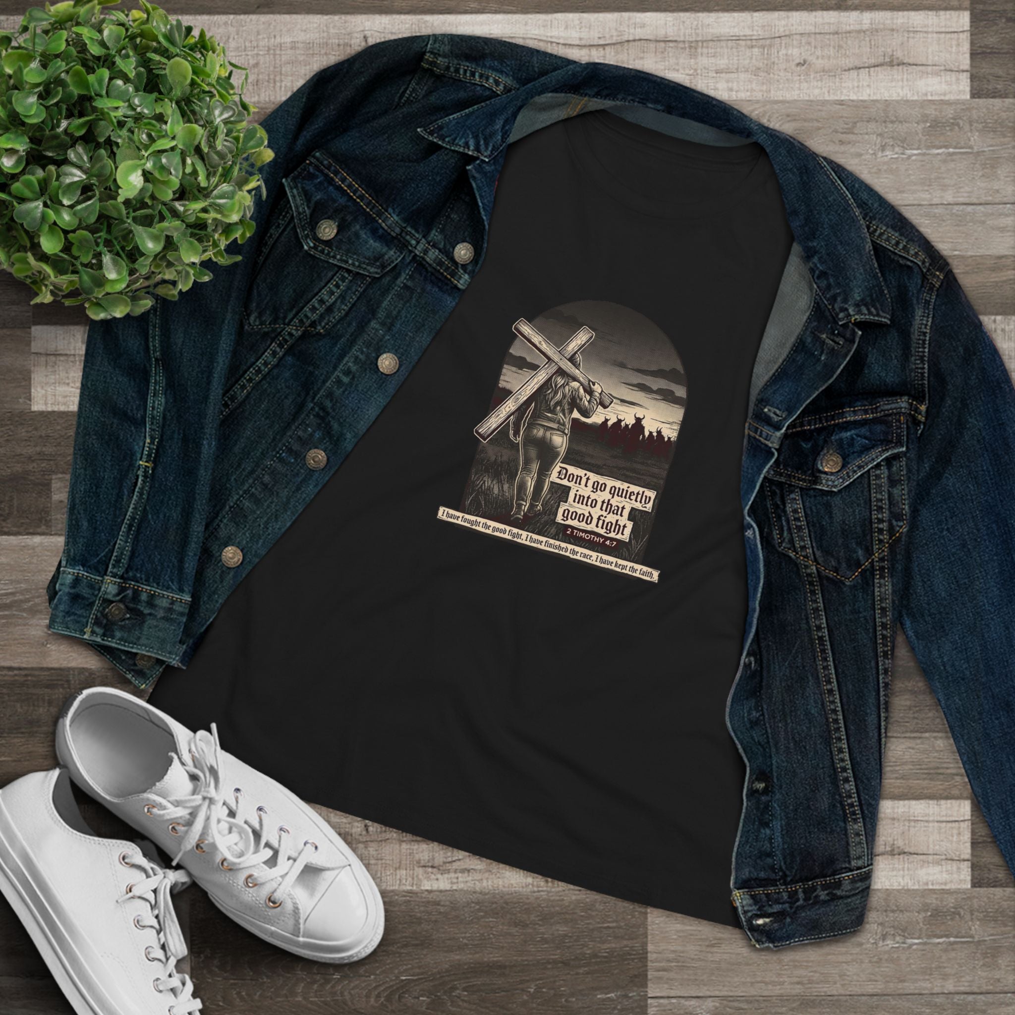 Black | Don't Go Quietly women's relaxed tee — flatlay with denim jacket